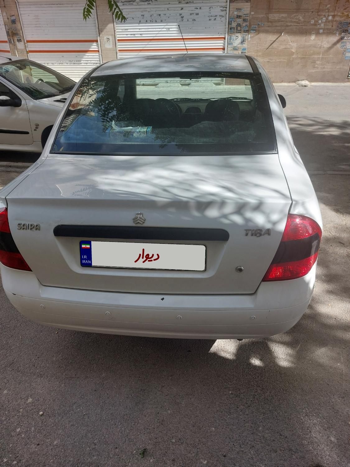 تیبا صندوق دار SX - 1391