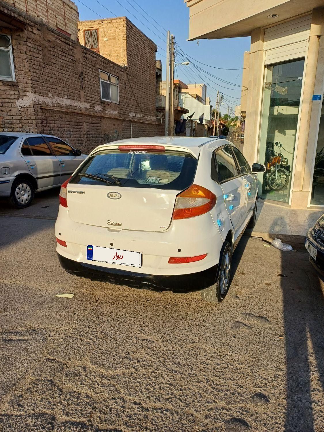 ام وی ام 315 هاچ بک ساده دنده ای - 2013