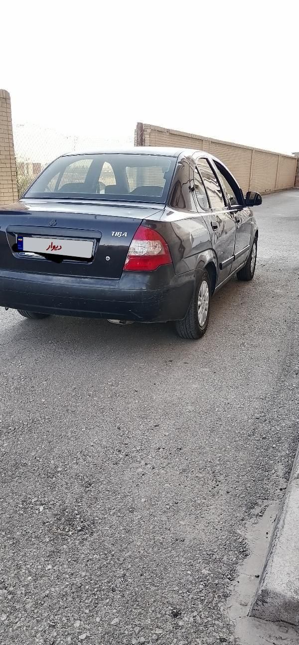 تیبا صندوق دار SX - 1390