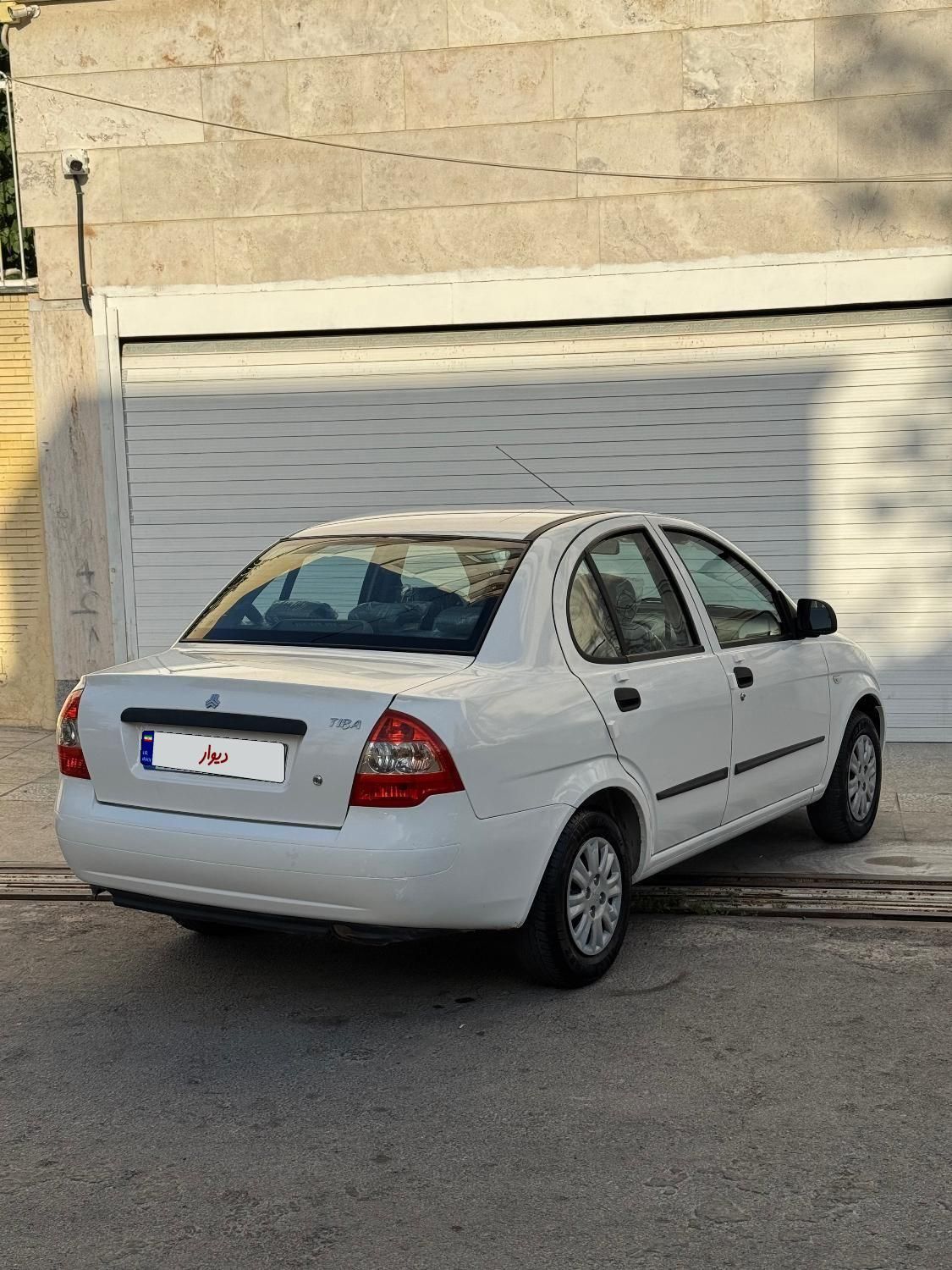 تیبا صندوق دار SX - 1401