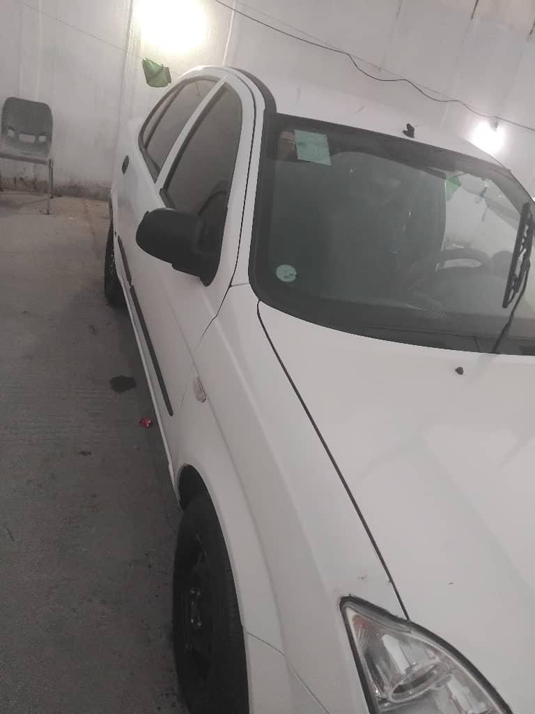 تیبا صندوق دار SX - 1401
