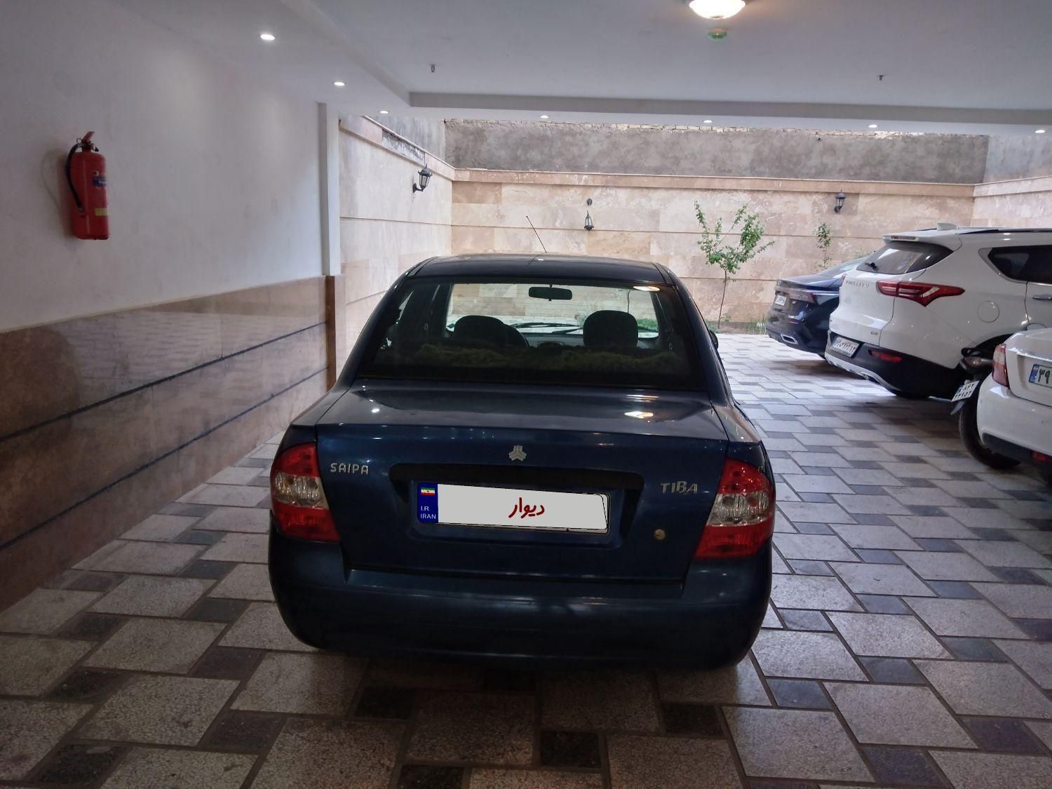 تیبا صندوق دار SX - 1390