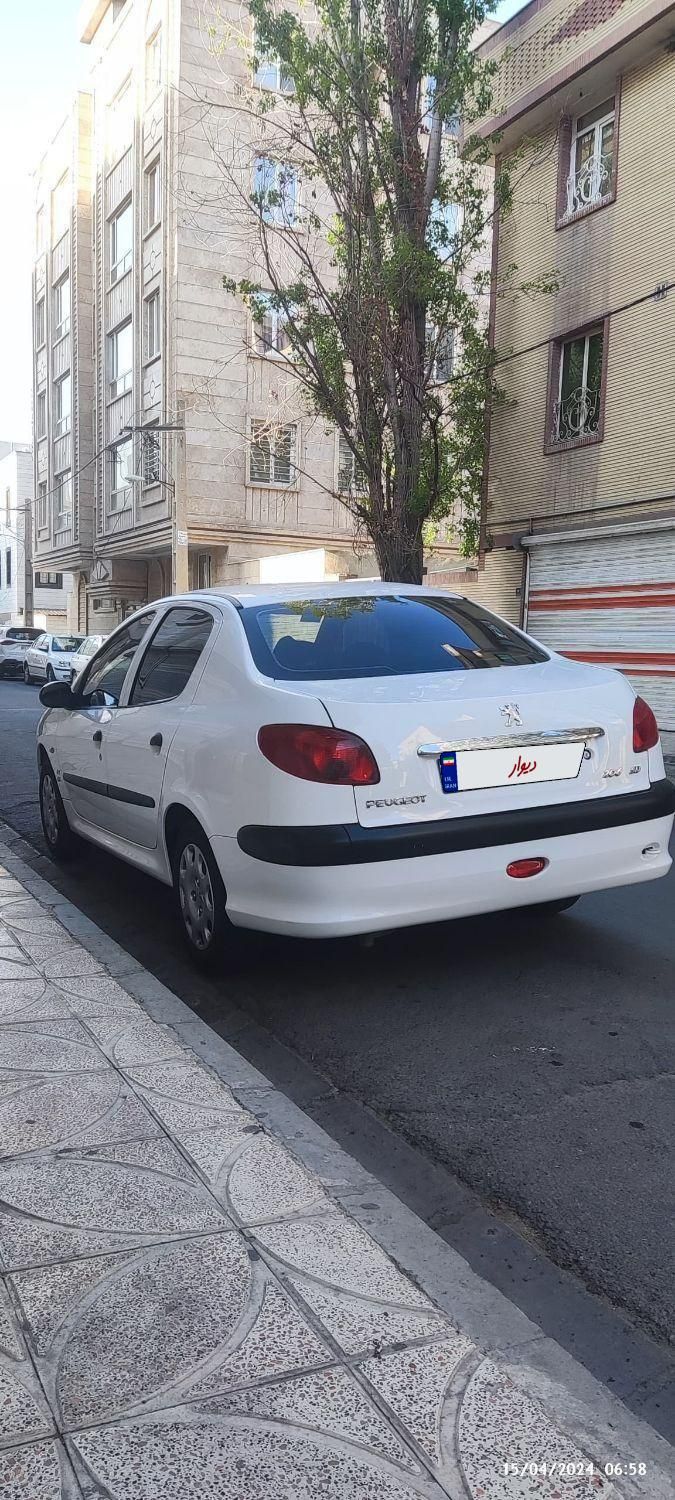 پژو ۲۰۶ صندوق دار v8 - 1397