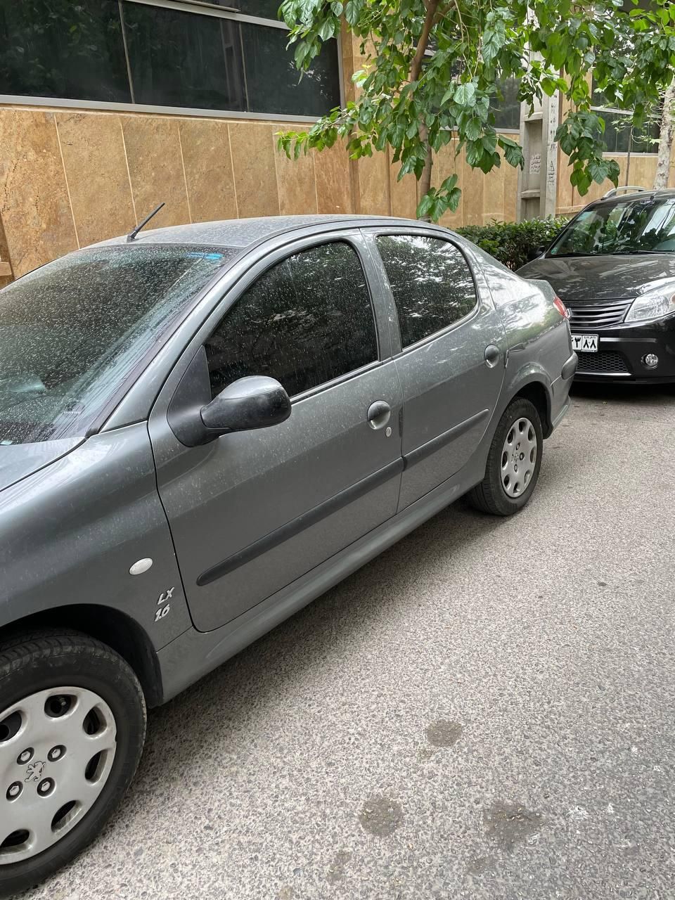 پژو ۲۰۶ صندوق دار v8 - 1396
