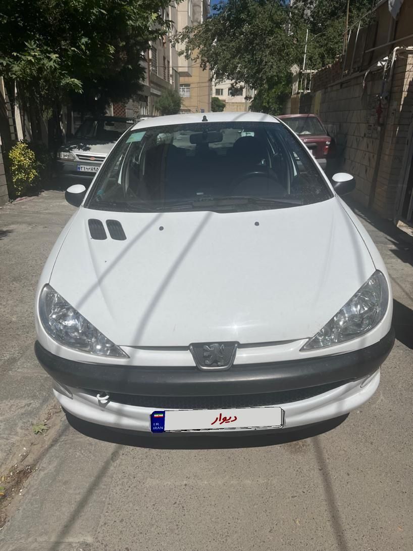 پژو ۲۰۶ صندوق دار v8 - 1396
