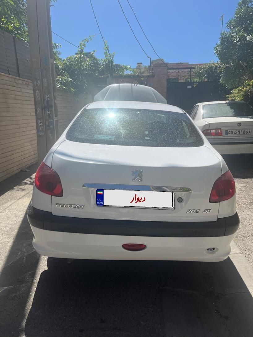 پژو ۲۰۶ صندوق دار v8 - 1396