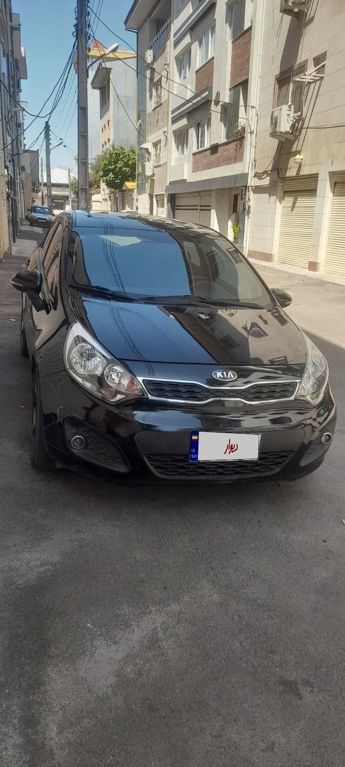 کیا ریو هاچ بک فول UB - 2015