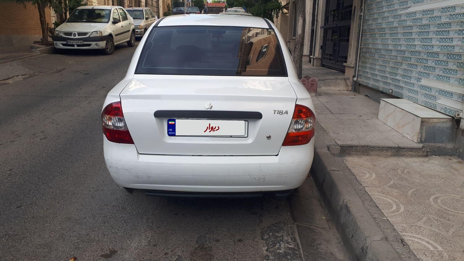 تیبا صندوق دار SX - 1401