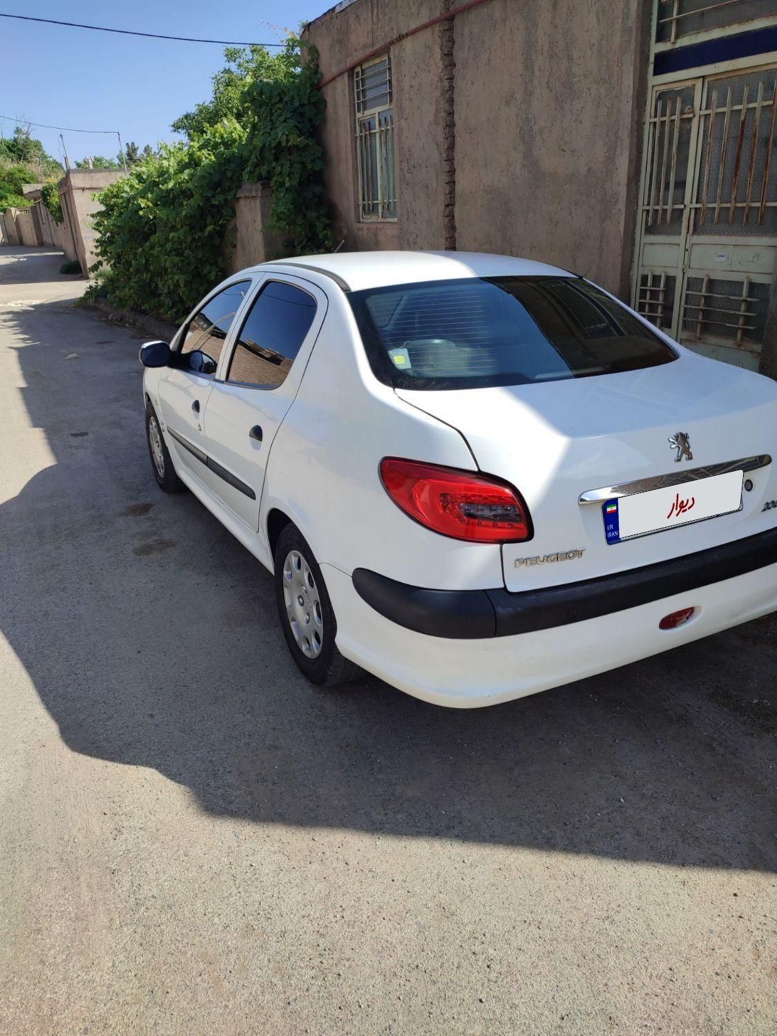 پژو ۲۰۶ صندوق دار v8 - 1394