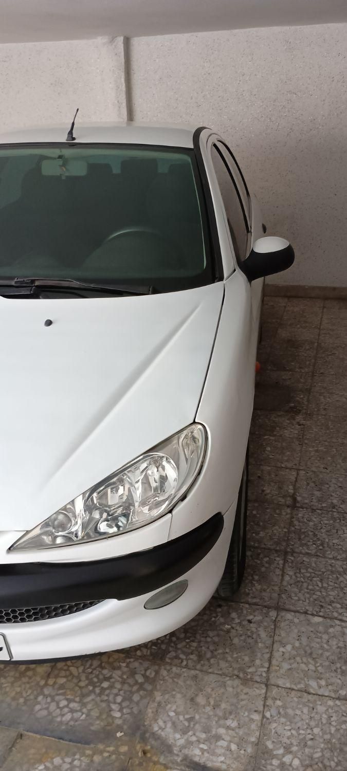 پژو ۲۰۶ صندوق دار v8 - 1391
