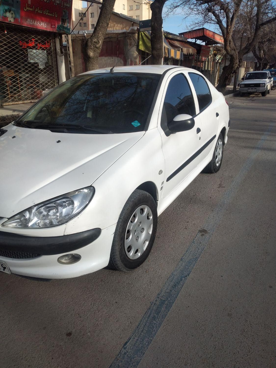 پژو ۲۰۶ صندوق دار v8 - 1392