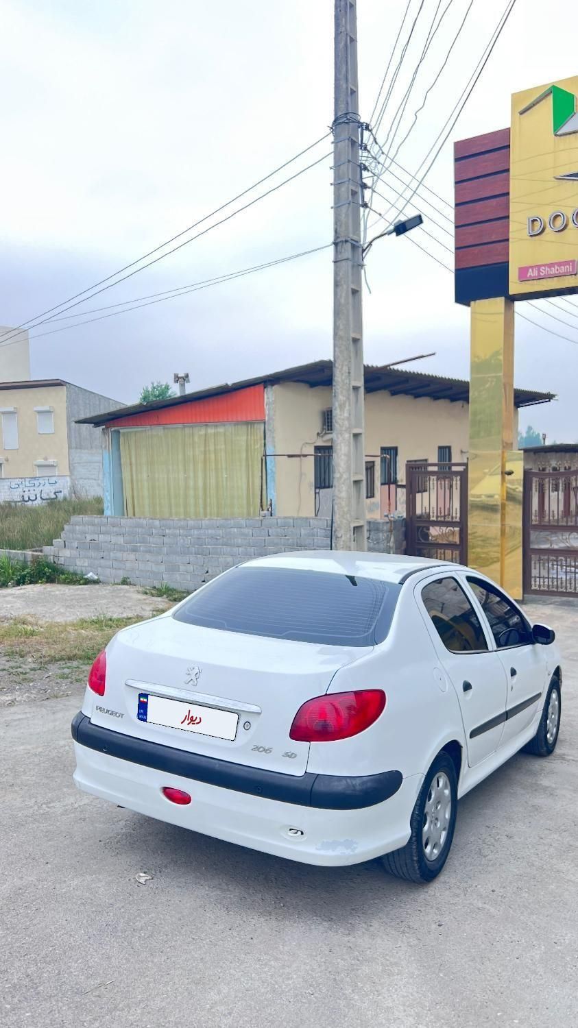 پژو ۲۰۶ صندوق دار v8 - 1394