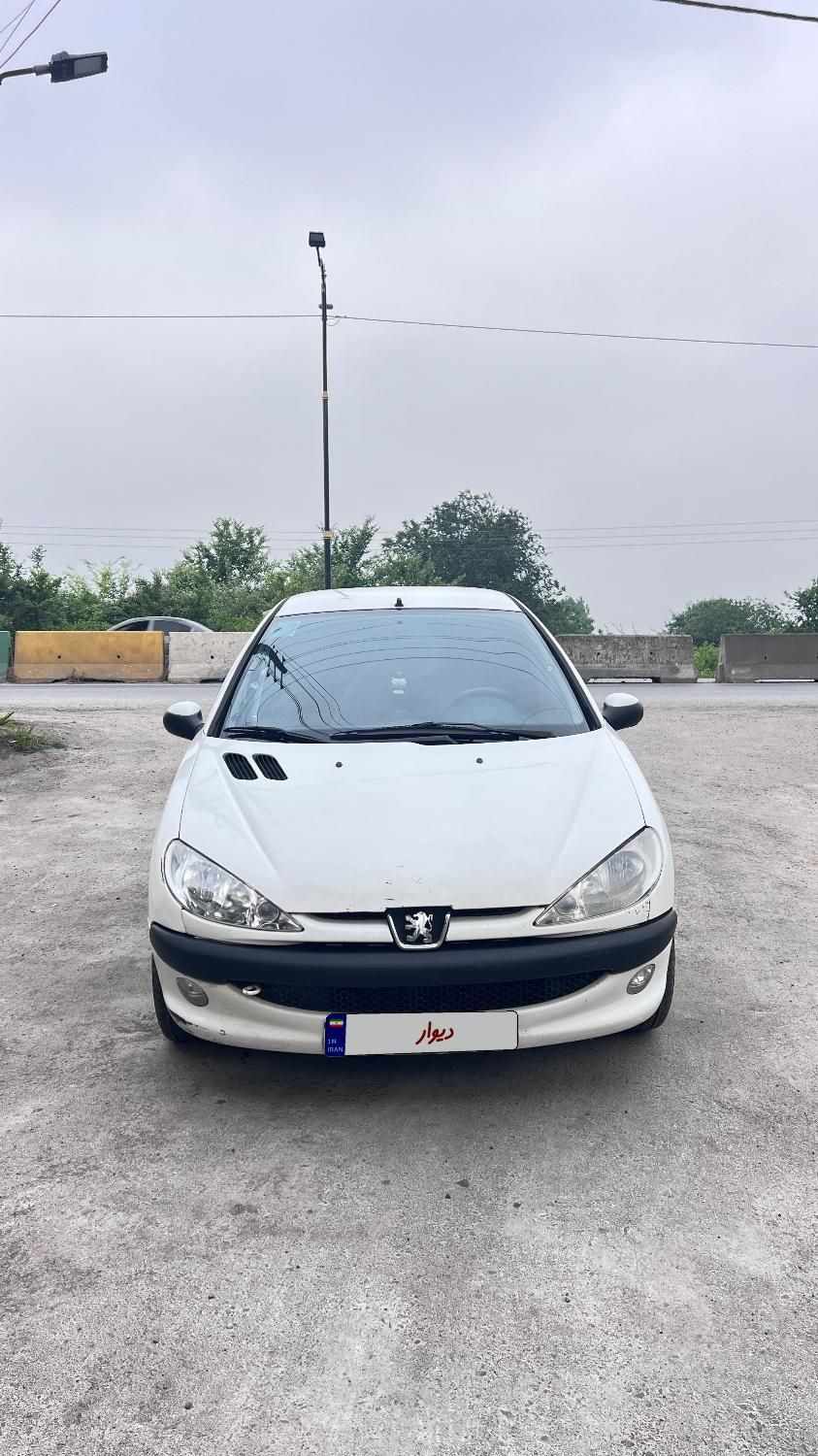 پژو ۲۰۶ صندوق دار v8 - 1394