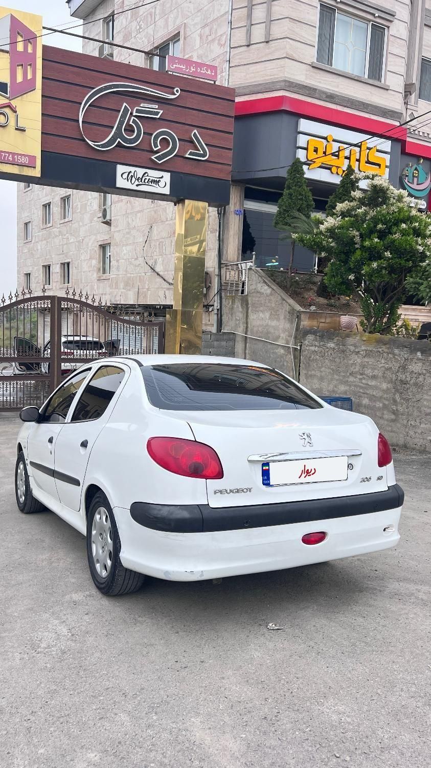 پژو ۲۰۶ صندوق دار v8 - 1394