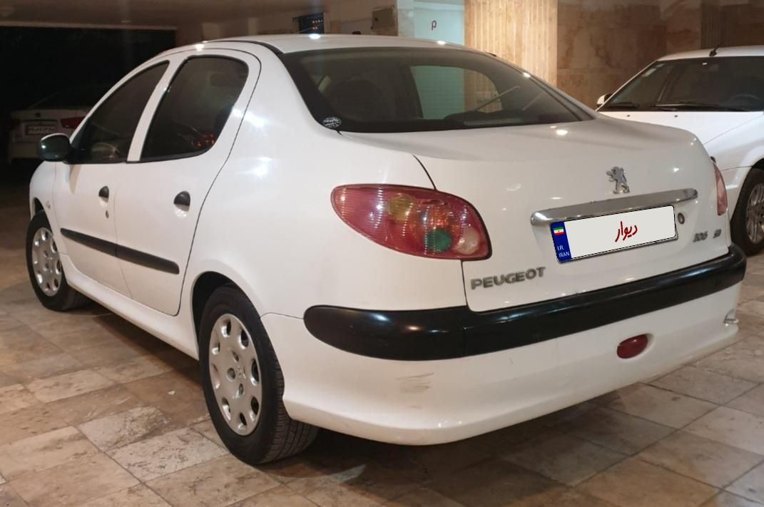 پژو ۲۰۶ صندوق دار v8 - 1395