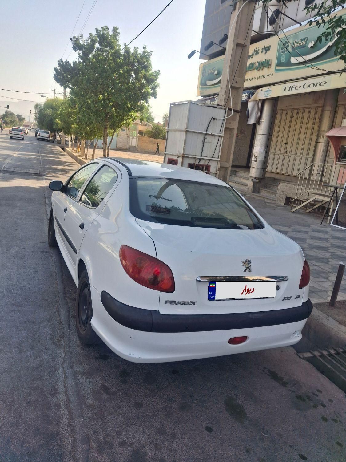 پژو ۲۰۶ صندوق دار v8 - 1394