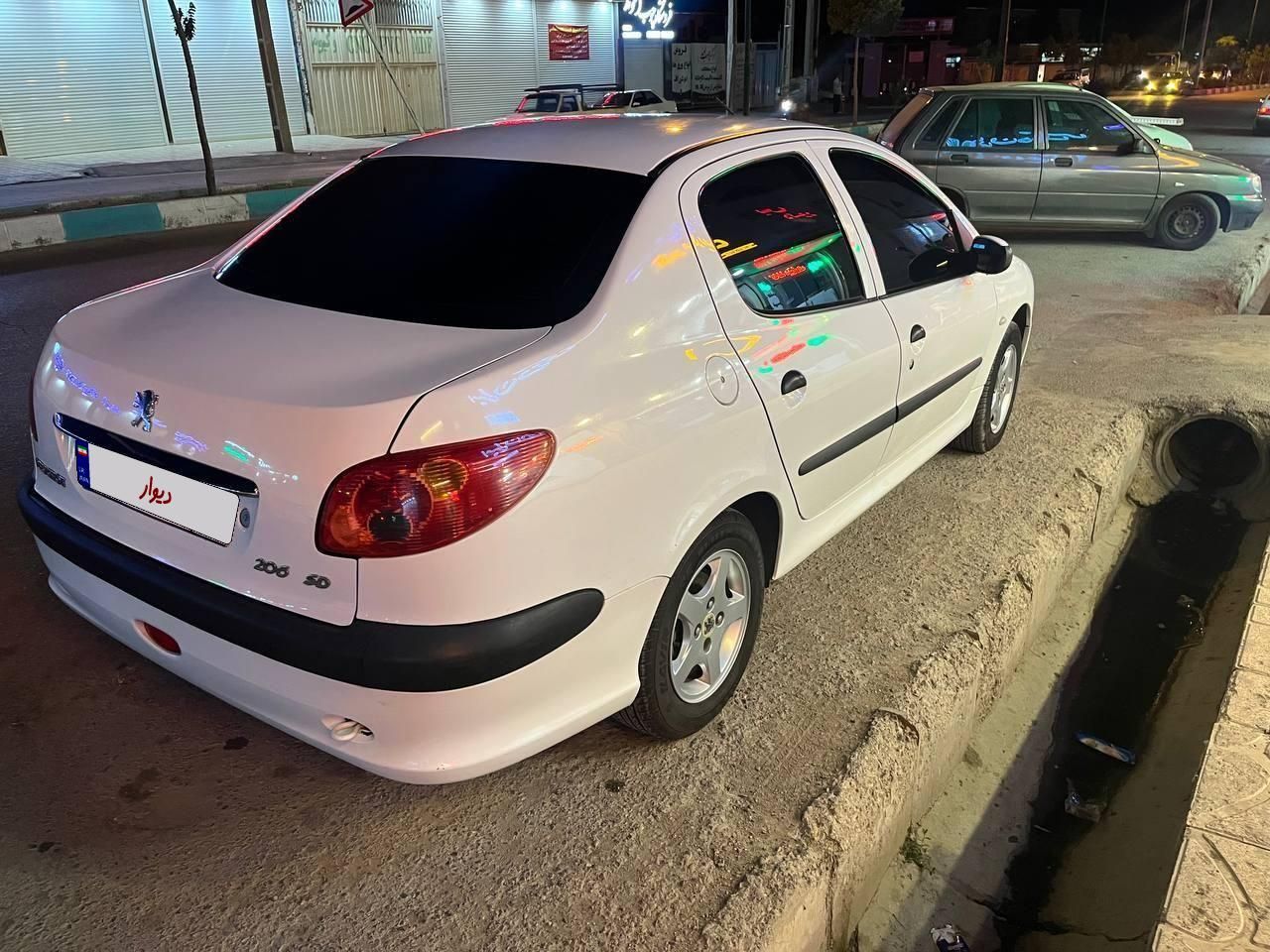 پژو ۲۰۶ صندوق دار v8 - 1395