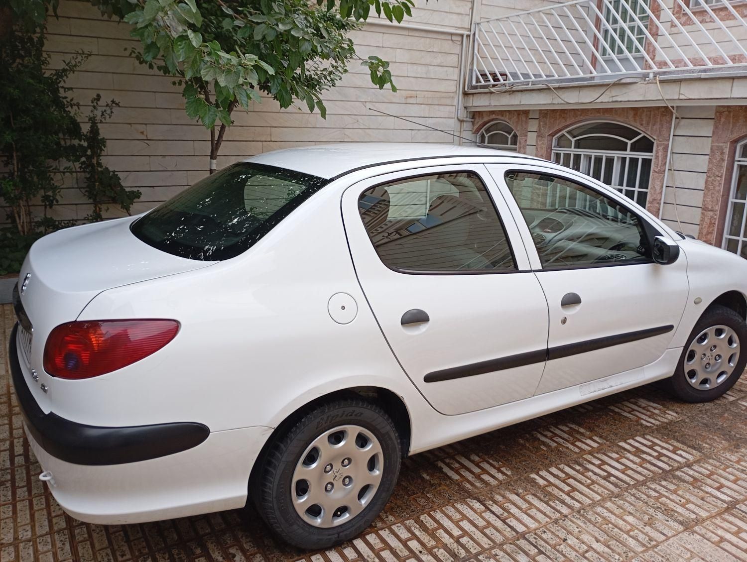 پژو ۲۰۶ صندوق دار v8 - 1399