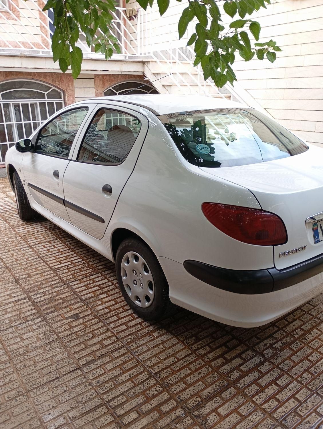 پژو ۲۰۶ صندوق دار v8 - 1399