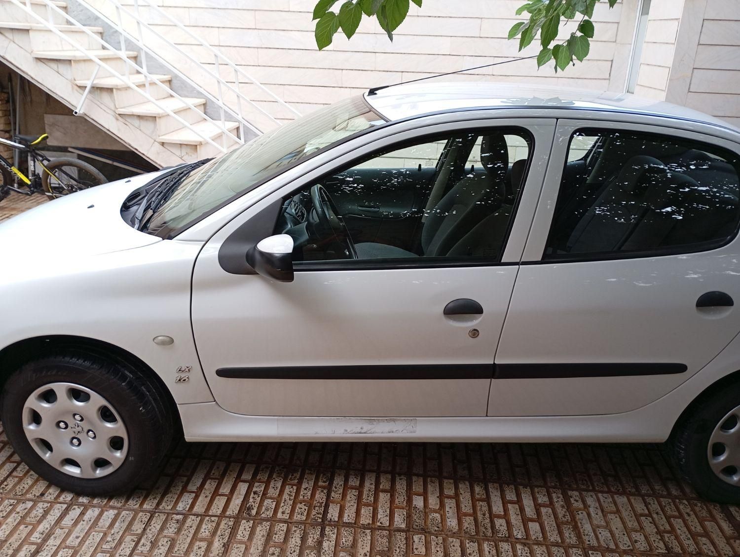 پژو ۲۰۶ صندوق دار v8 - 1399