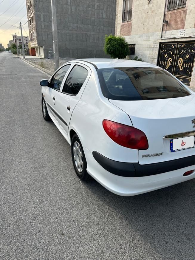پژو ۲۰۶ صندوق دار v8 - 1393