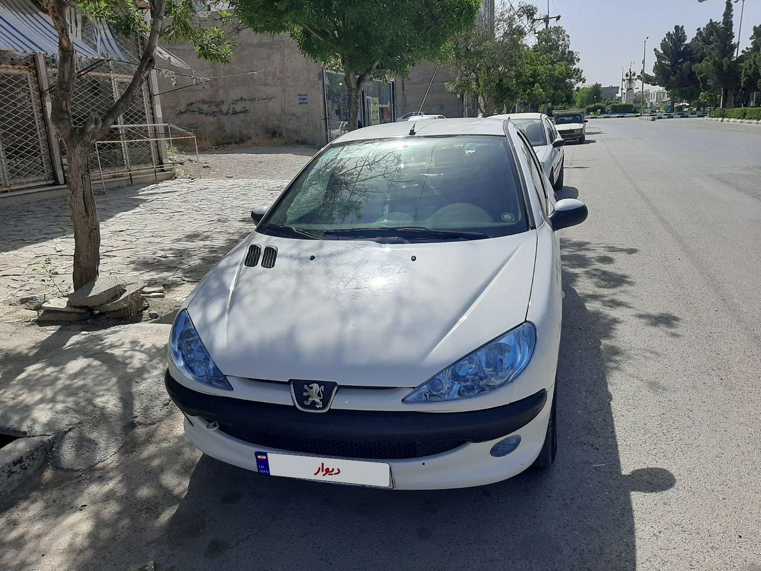 پژو ۲۰۶ صندوق دار v8 - 1394