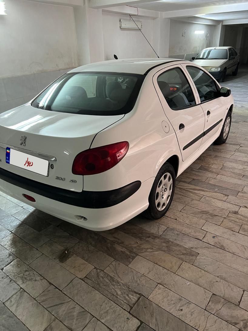 پژو ۲۰۶ صندوق دار v8 - 1395