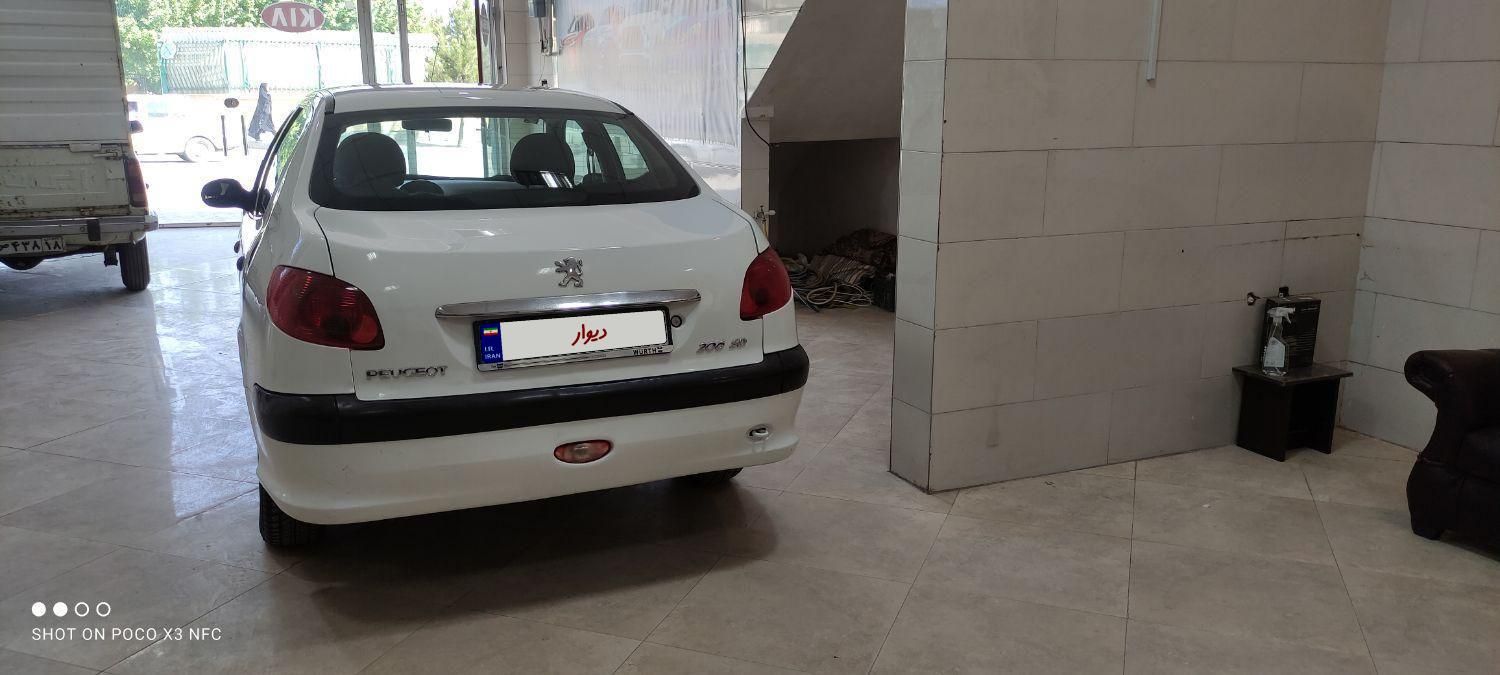 پژو ۲۰۶ صندوق دار v8 - 1390
