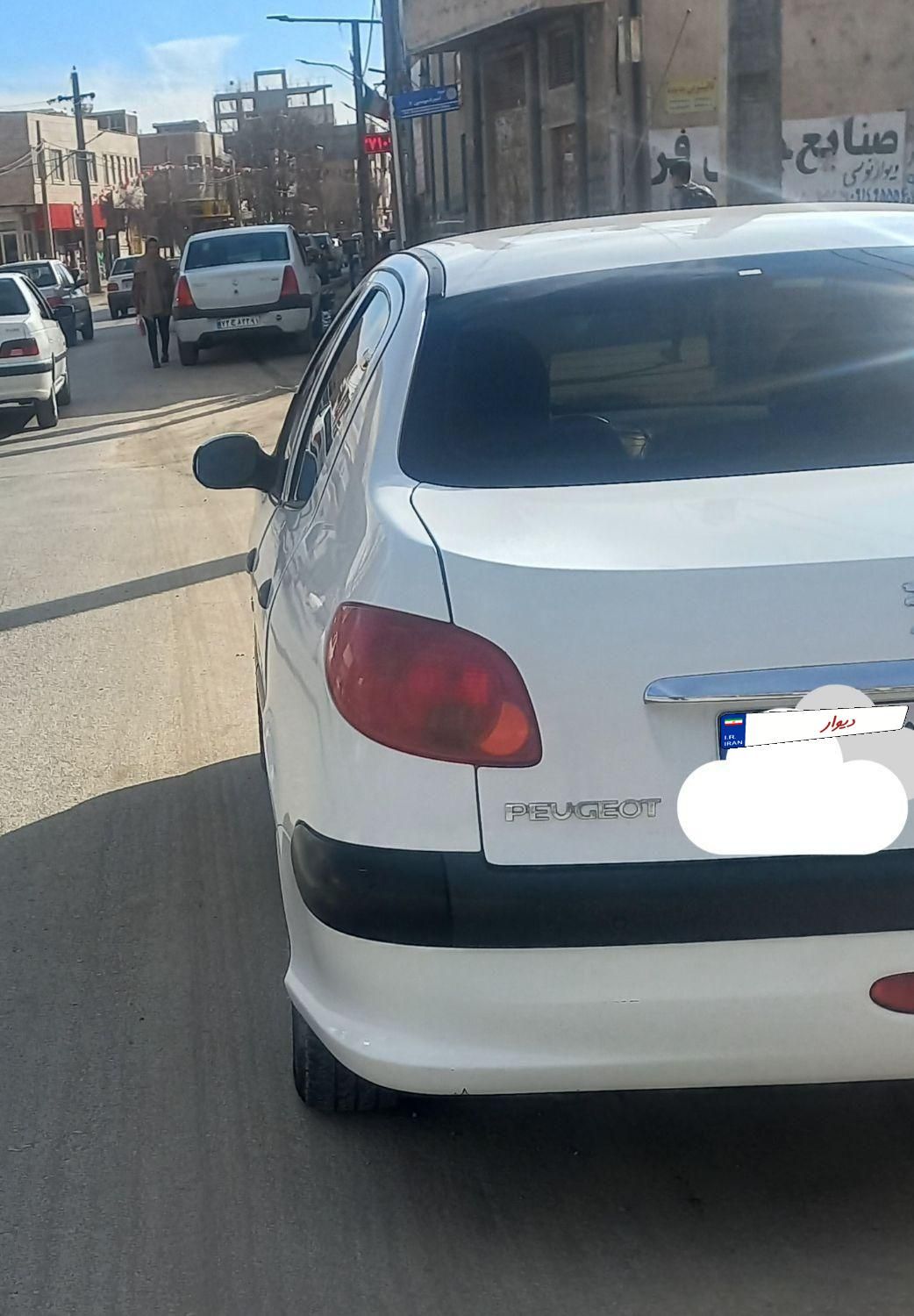 پژو ۲۰۶ صندوق دار v8 - 1396