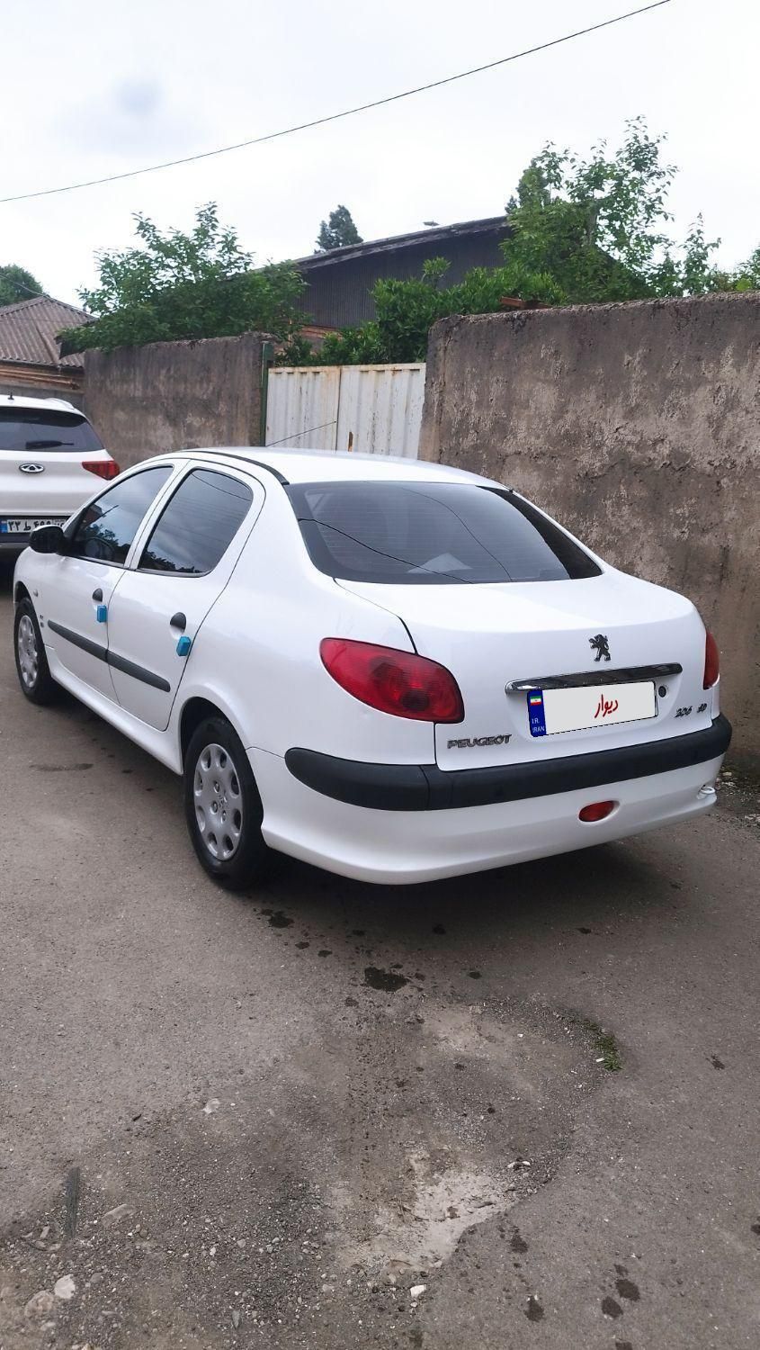 پژو ۲۰۶ صندوق دار v8 - 1396