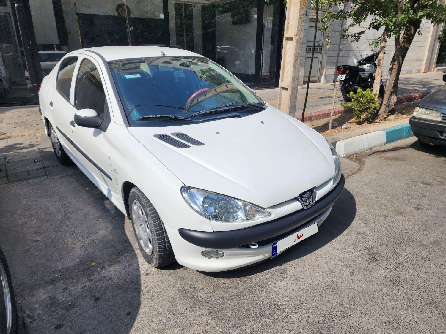 پژو ۲۰۶ صندوق دار v8 - 1395