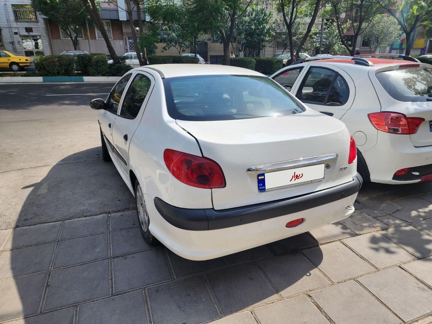 پژو ۲۰۶ صندوق دار v8 - 1395