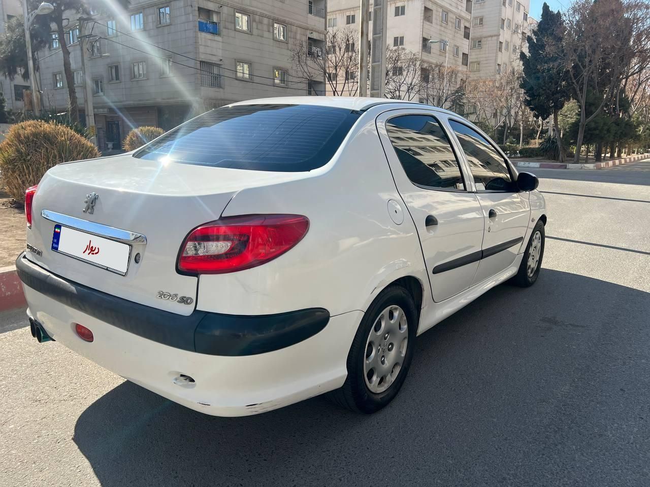 پژو ۲۰۶ صندوق دار v8 - 1395