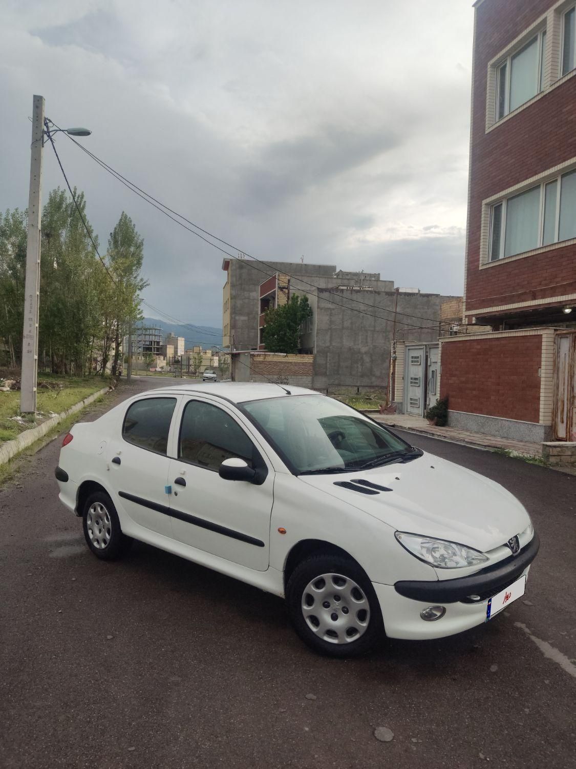 پژو ۲۰۶ صندوق دار v8 - 1394