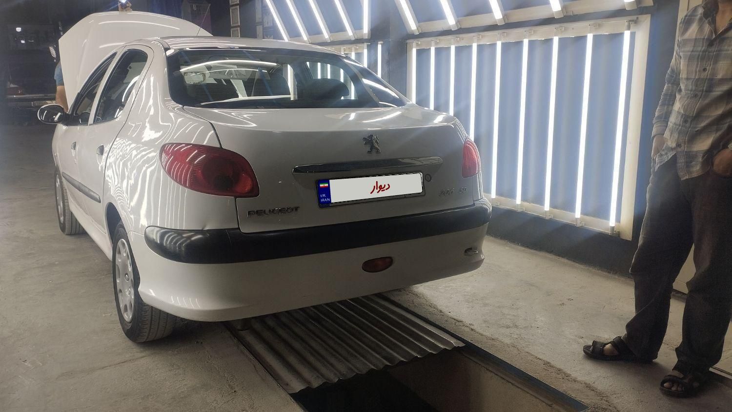 پژو ۲۰۶ صندوق دار v8 - 1396