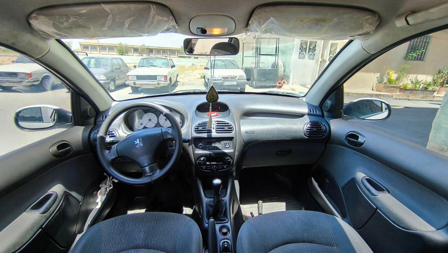 پژو ۲۰۶ صندوق دار v8 - 1399