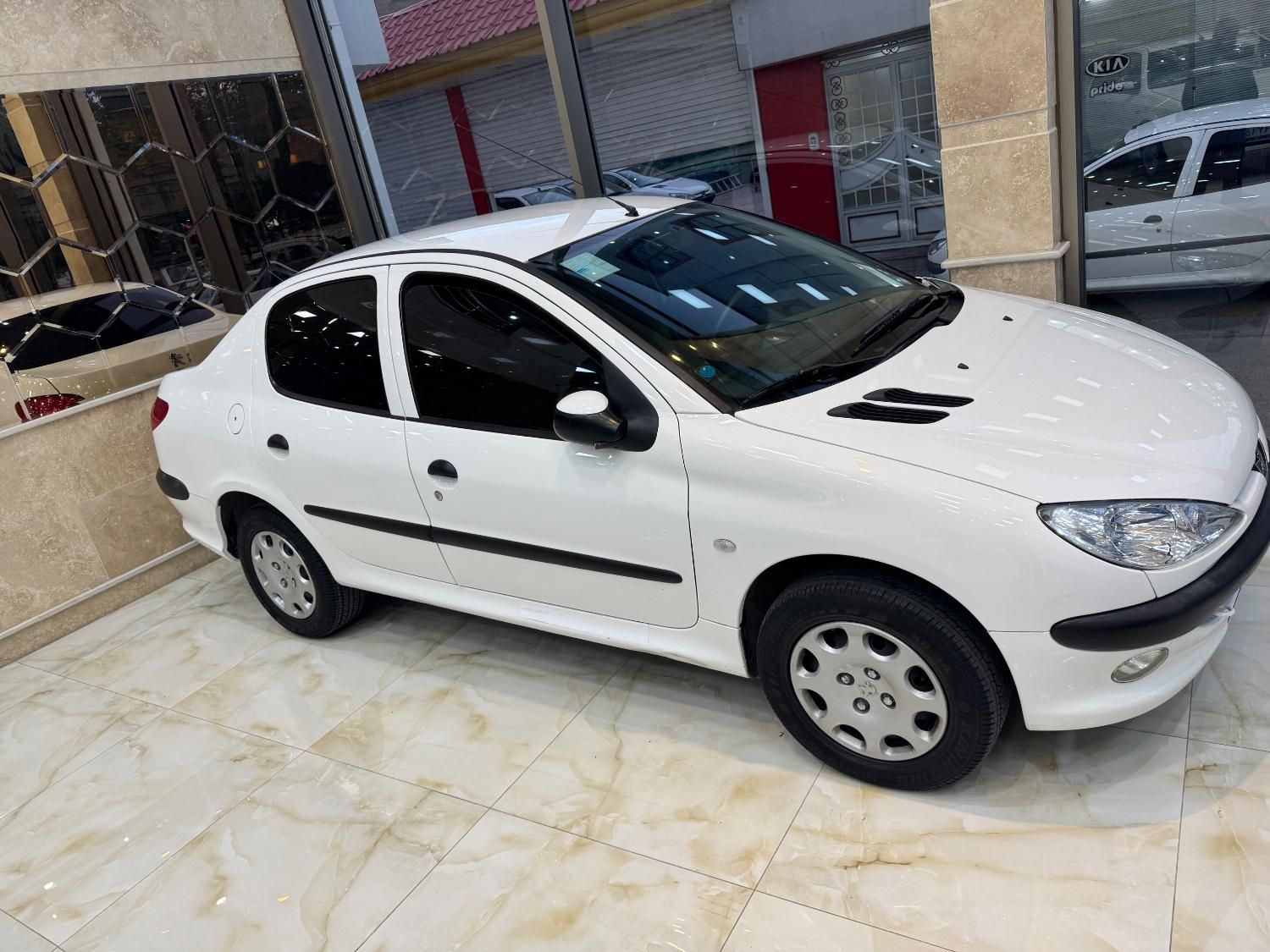 پژو ۲۰۶ صندوق دار v8 - 1397
