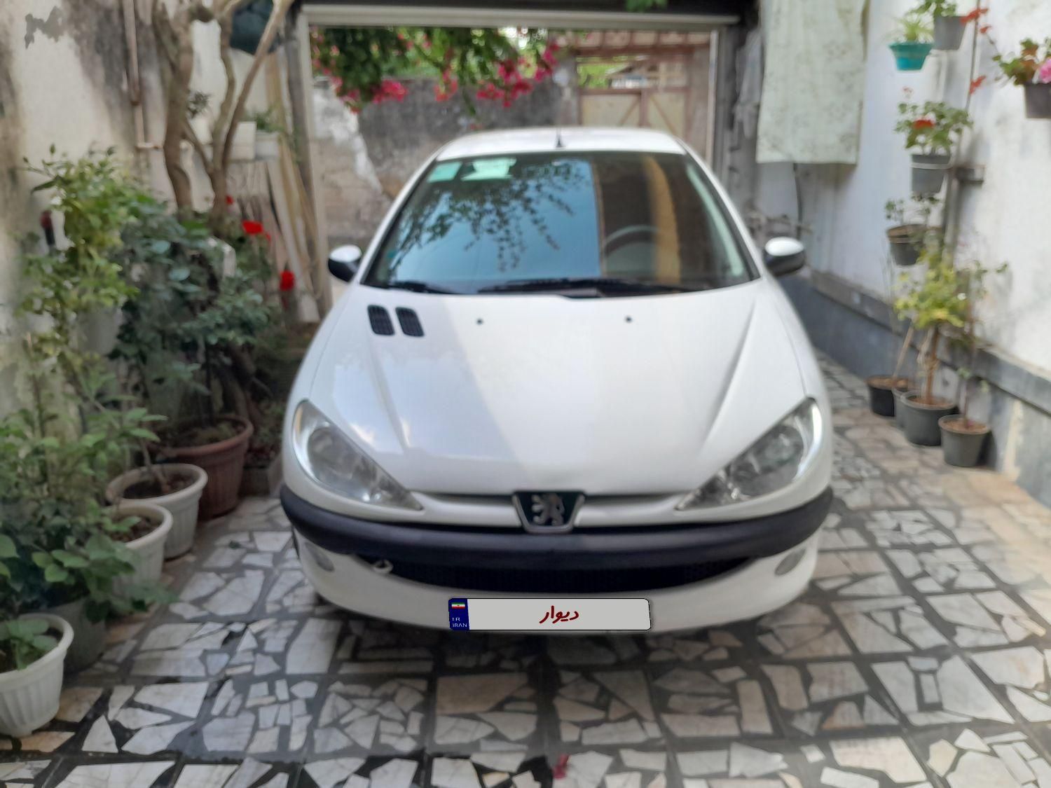 پژو ۲۰۶ صندوق دار v8 - 1396