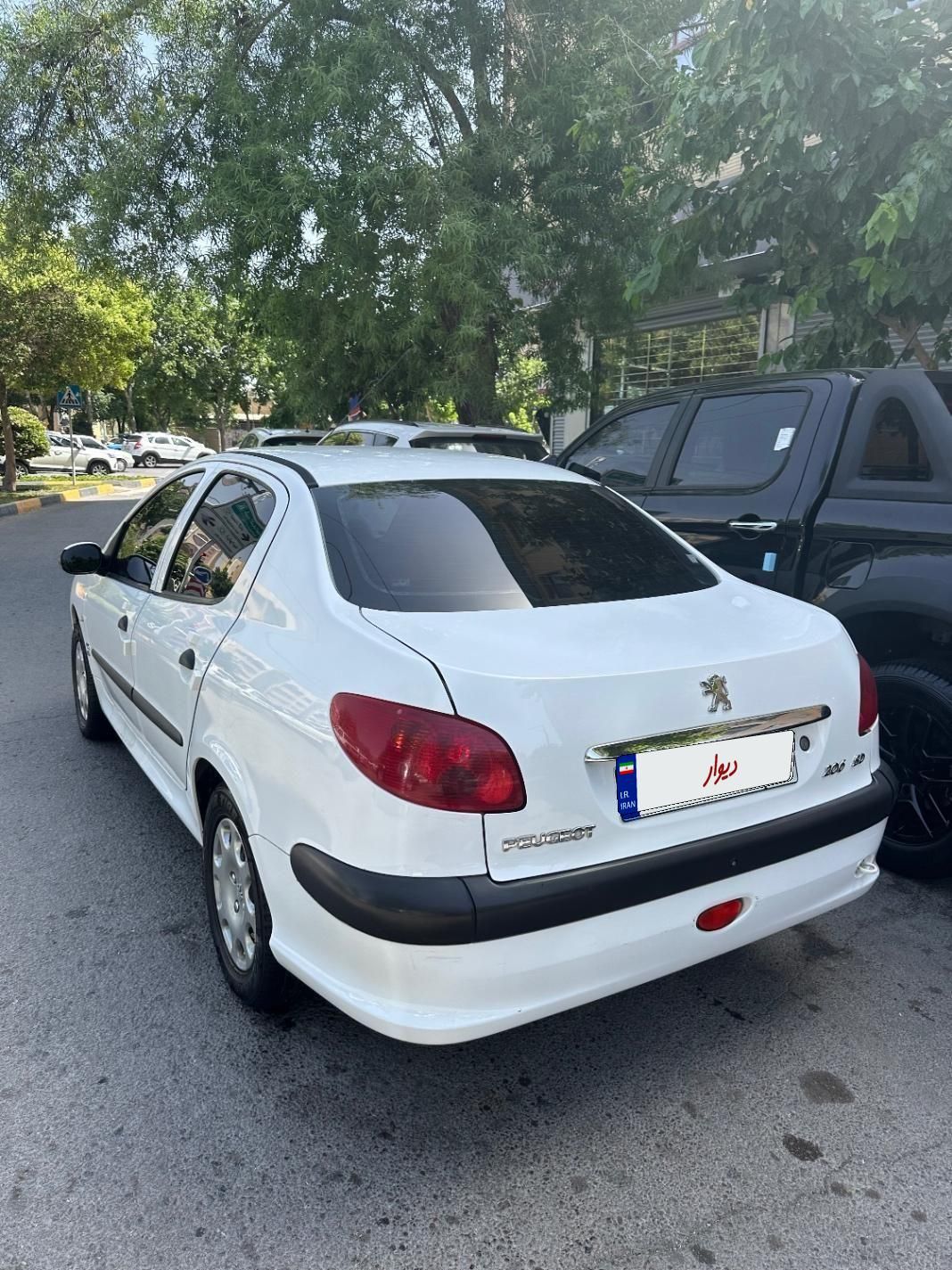 پژو ۲۰۶ صندوق دار v8 - 1398