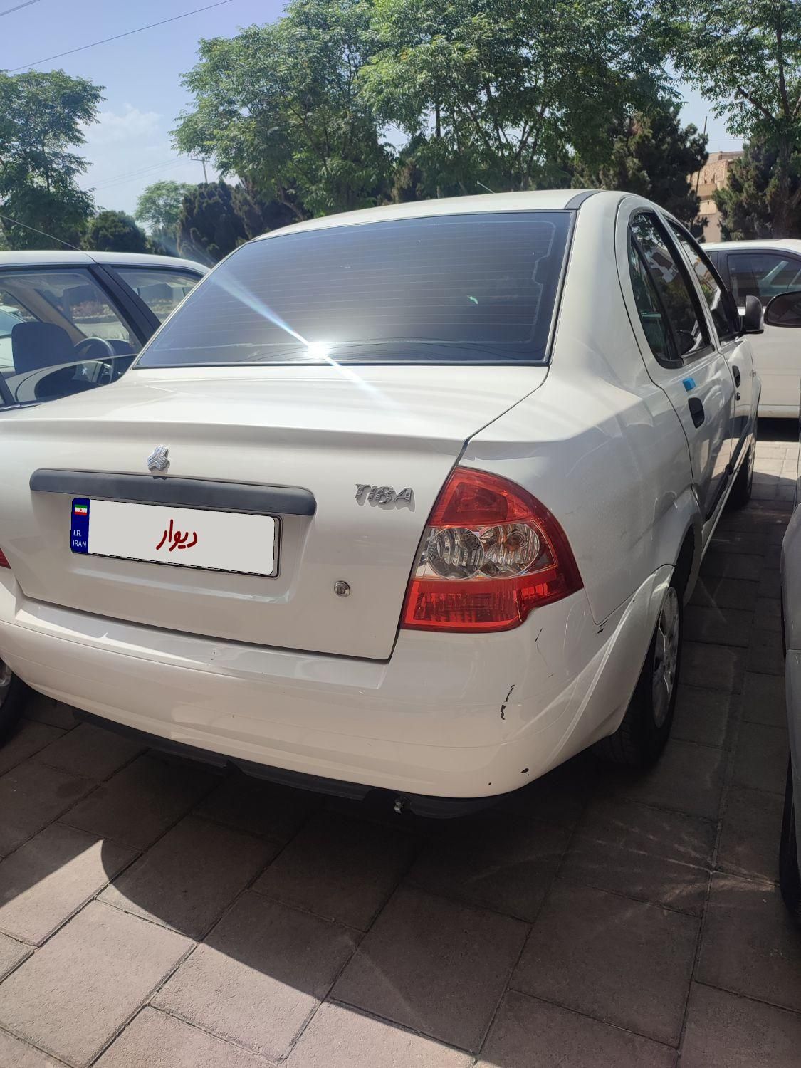 تیبا صندوق دار SX - 1401