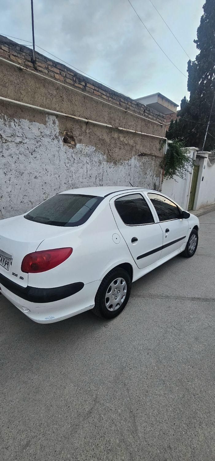 پژو ۲۰۶ صندوق دار v8 - 1391