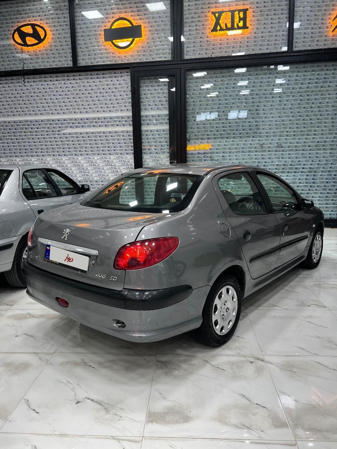 پژو ۲۰۶ صندوق دار v8 - 1390