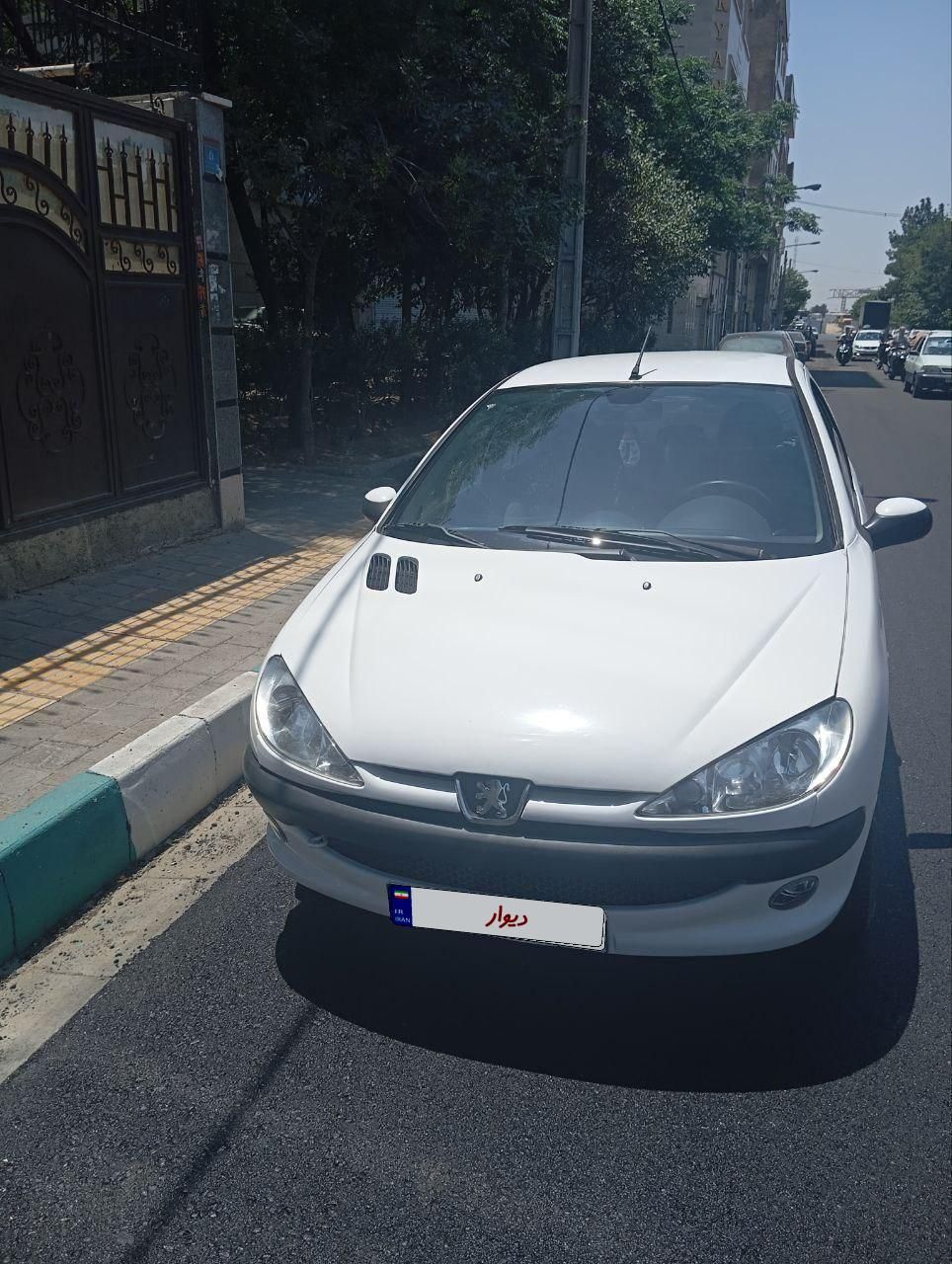 پژو ۲۰۶ صندوق دار v8 - 1398