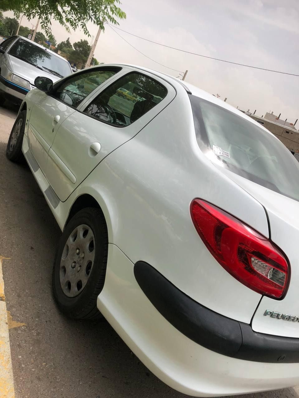 پژو ۲۰۶ صندوق دار v8 - 1396