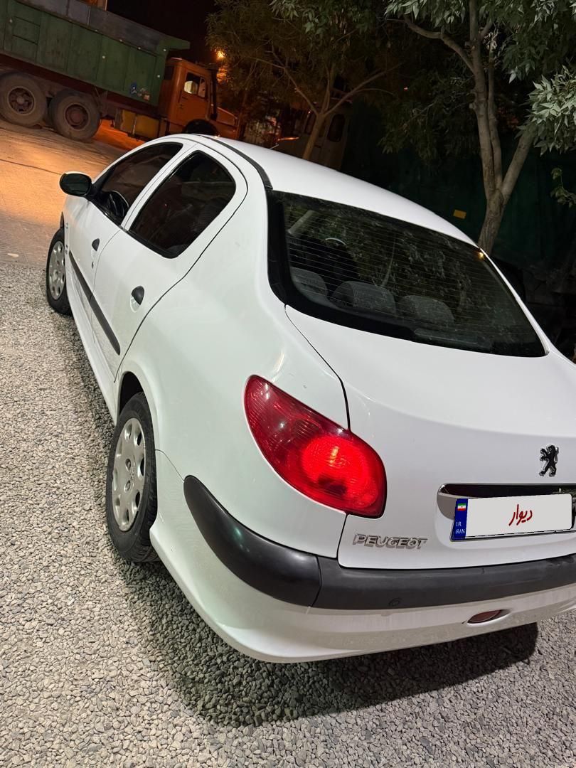 پژو ۲۰۶ صندوق دار v8 - 1394