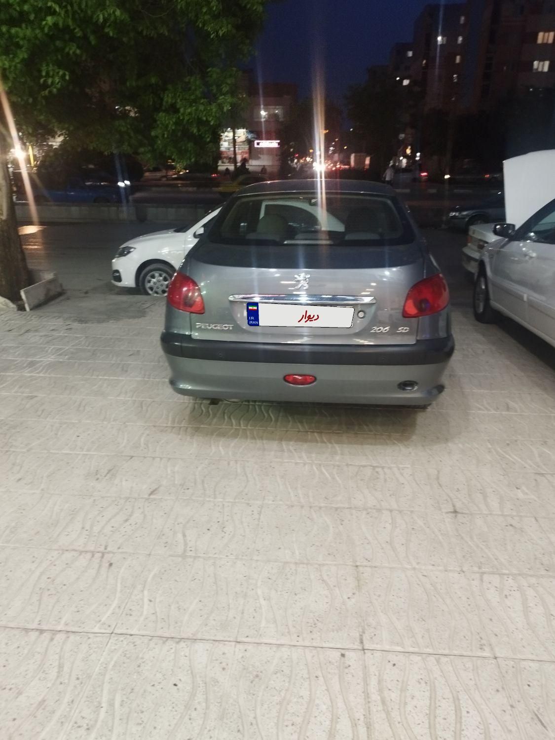 پژو ۲۰۶ صندوق دار v8 - 1396