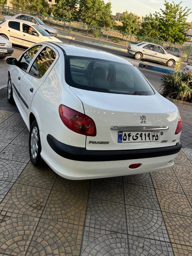 پژو ۲۰۶ صندوق دار v8 - 1395