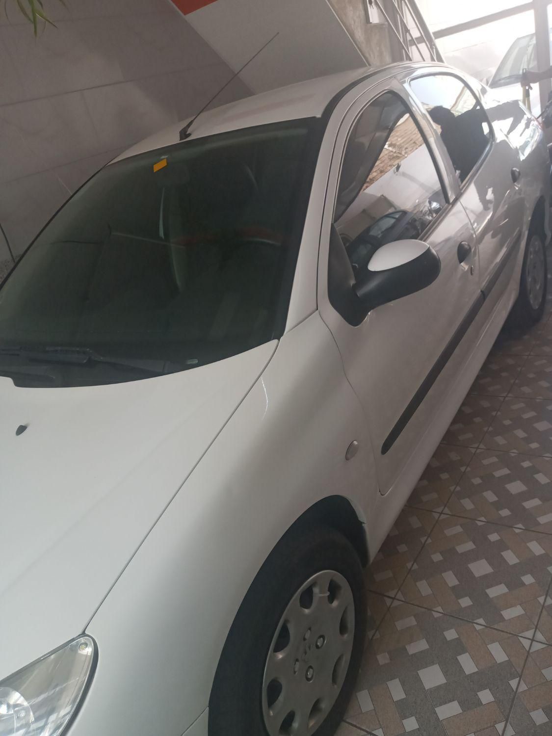 پژو ۲۰۶ صندوق دار v8 - 1397