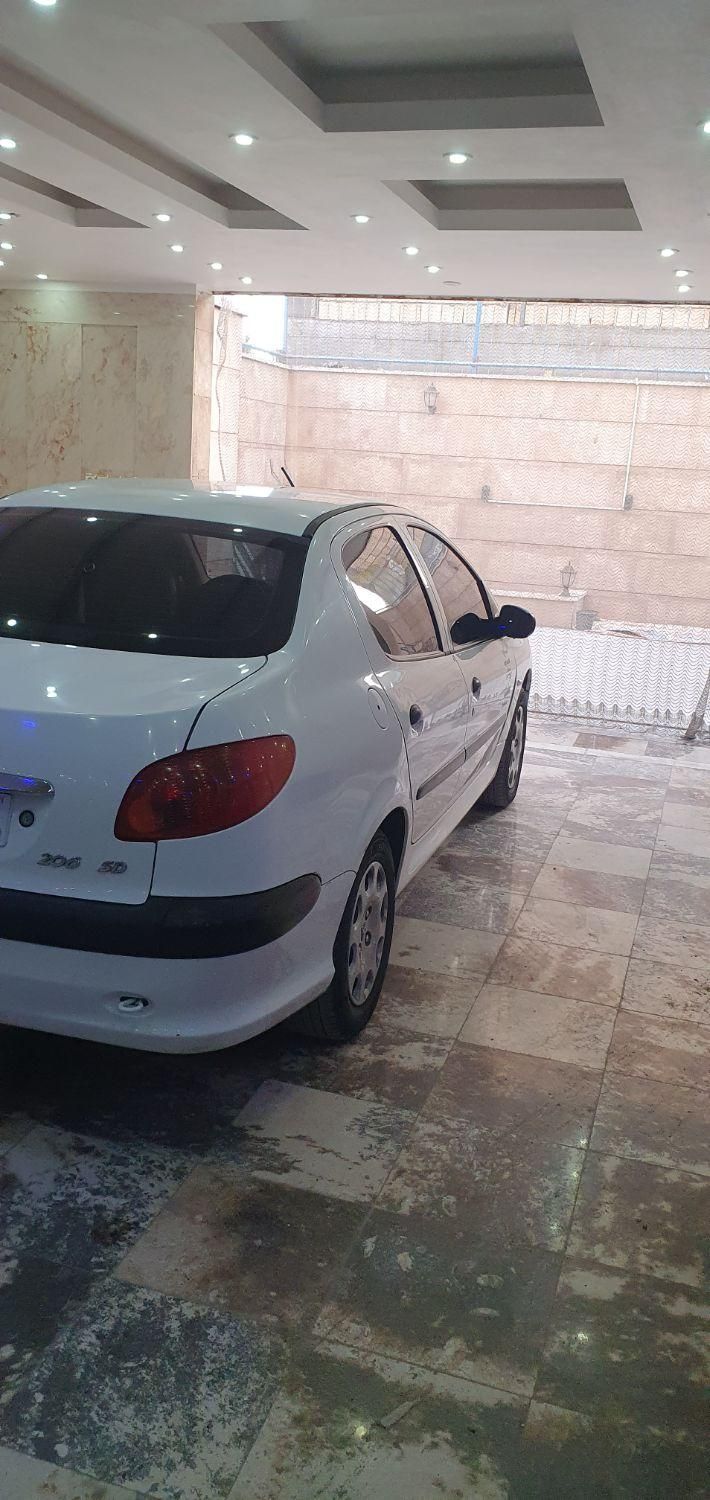 پژو ۲۰۶ صندوق دار v8 - 1395