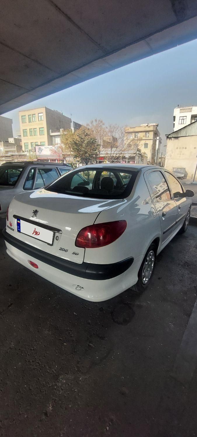 پژو ۲۰۶ صندوق دار v8 - 1398